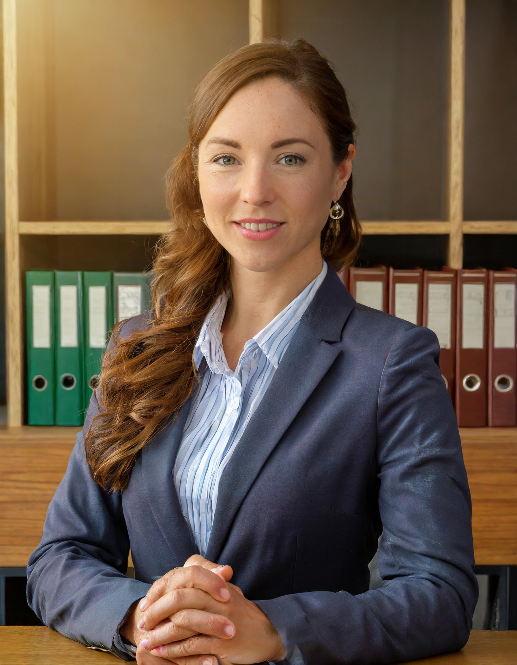 Young woman with long hair in business attire